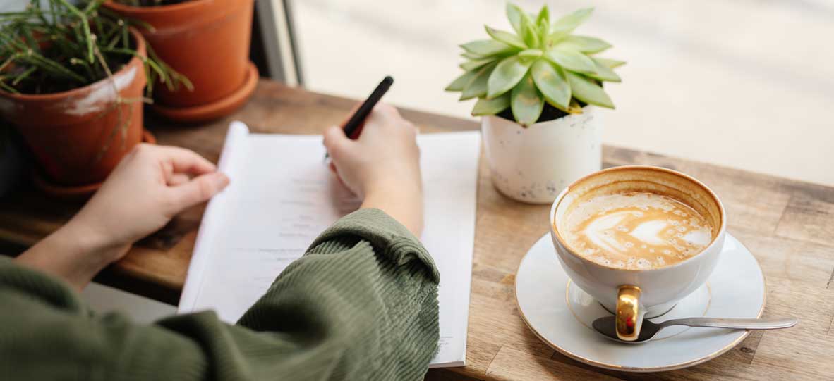 person writing notes