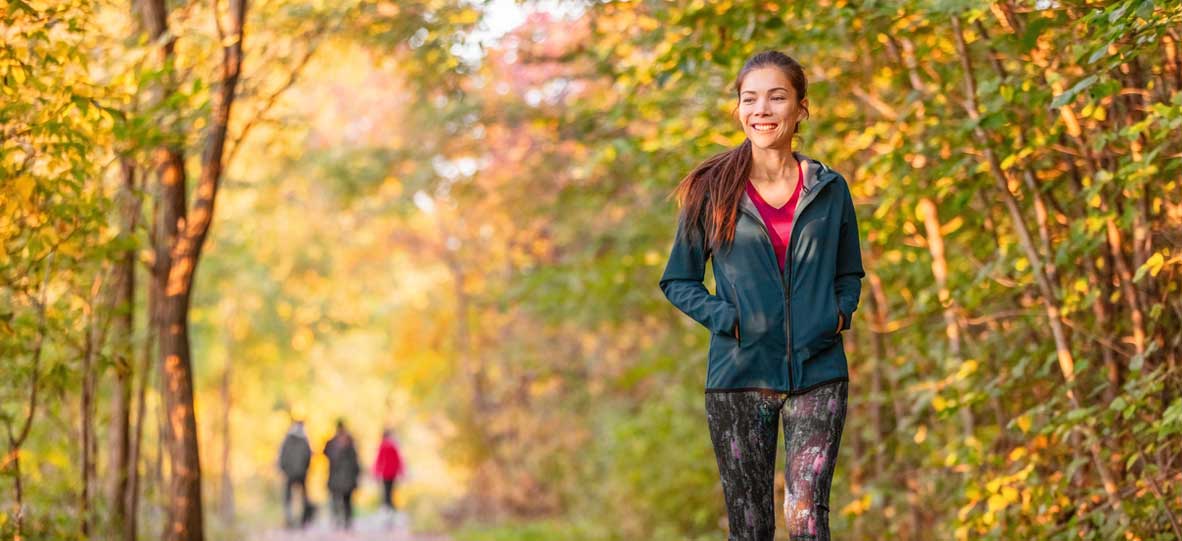 woman walking in woods
