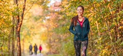 woman walking in woods