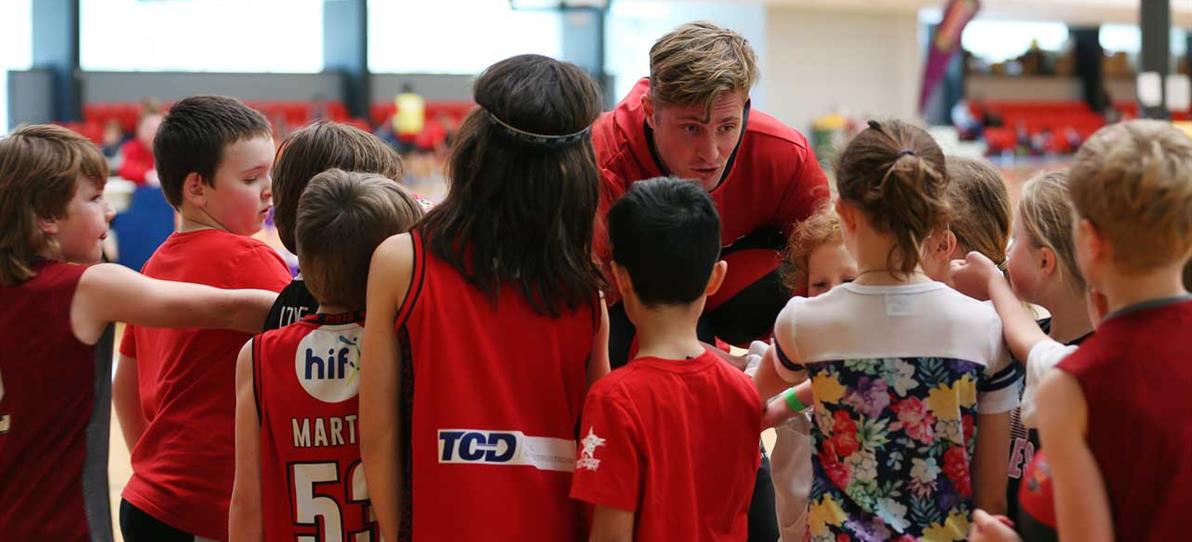 Wildcat player training children