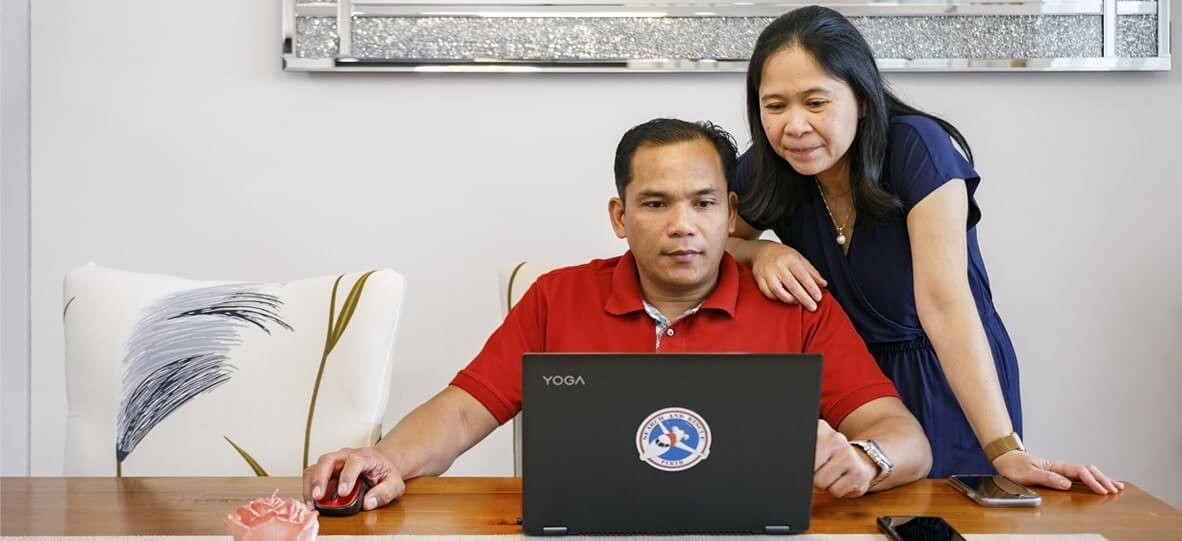 couple looking at laptop